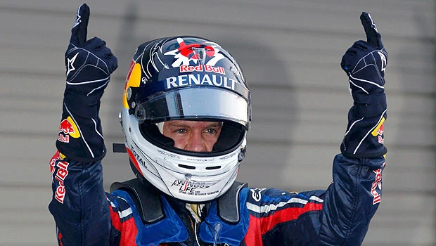Vettel seals second F1 title, Button wins race