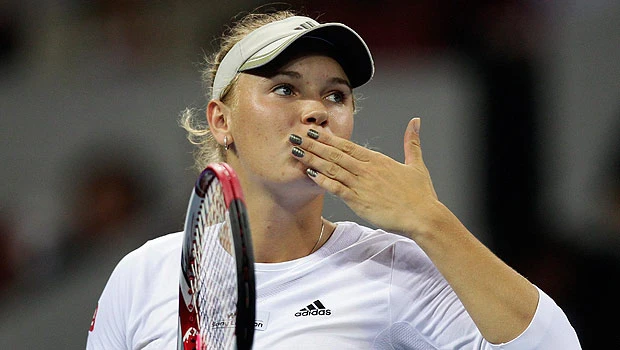 Wozniacki beaten as Ivanovic joins casualty list
