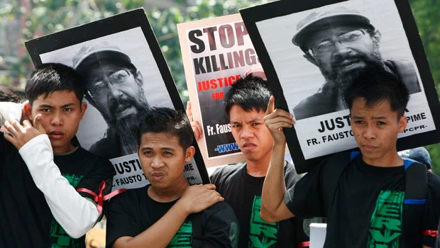 Slain Italian missionary buried in the Philippines