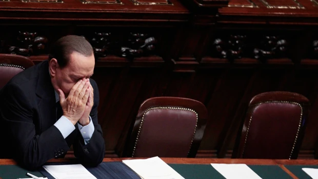 ‘Weakened’ Berlusconi survives confidence vote