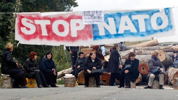 Serbs stop NATO removing roadblocks in north Kosovo