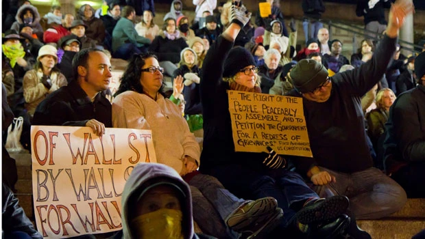 US protesters defy curfew a third time
