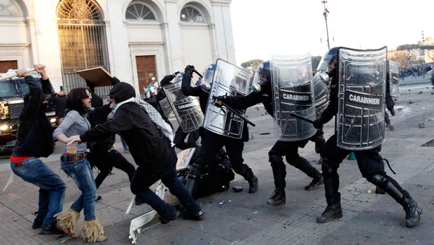 Global protest against corporate greed turn violent in Rome