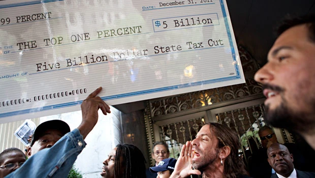 Protesters march past millionaires’ New York homes