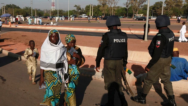 Nigerian forces hunt killers, locals demand security