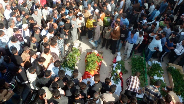 Dozens killed in Syrian city of Homs, day after Arab deal
