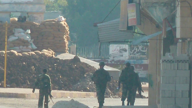 Syria offers amnesty to protesters; troops kill 15