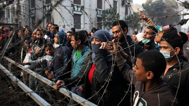 Truce quiets Cairo streets; army apologizes