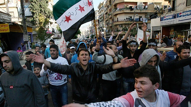 Syria yet to agree to Arab deal, asks questions