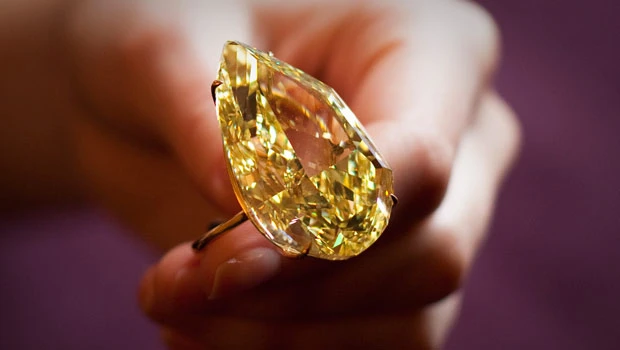 Giant yellow diamond auctioned for over $10.9m