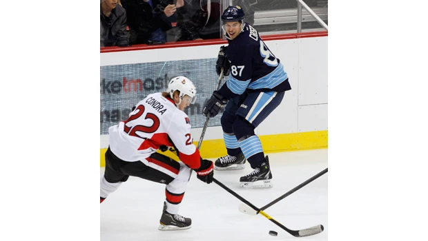 Crosby passes Penguins past Senators