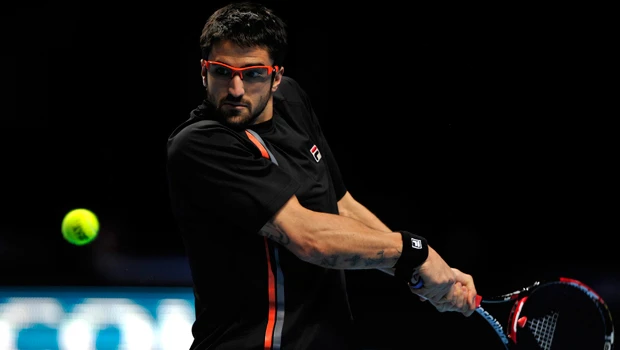Djokovic left sweating after Tipsarevic shock