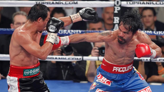 Pacquiao’s struggle could spur Mayweather fight
