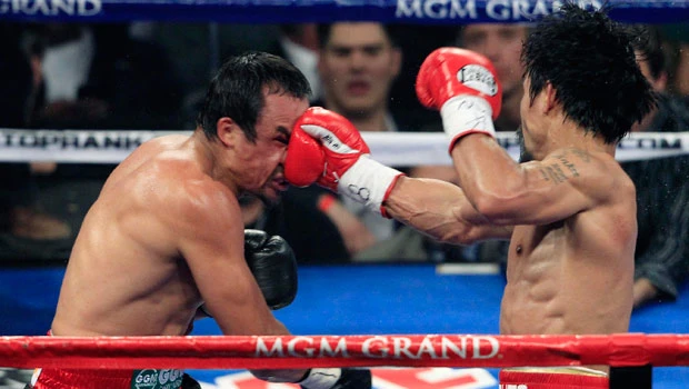 Pacquiao edges Marquez on tight decision