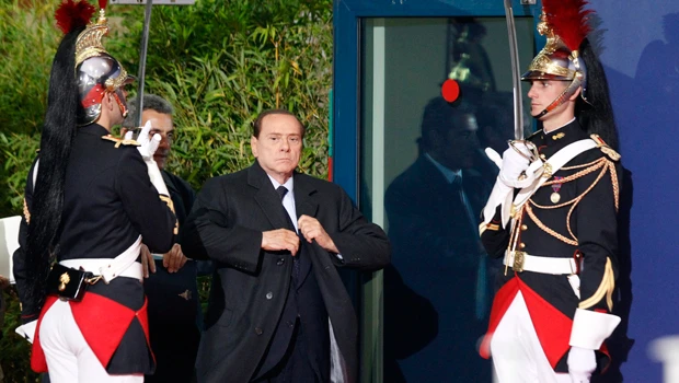 Italy’s premier faces mounting pressure to go