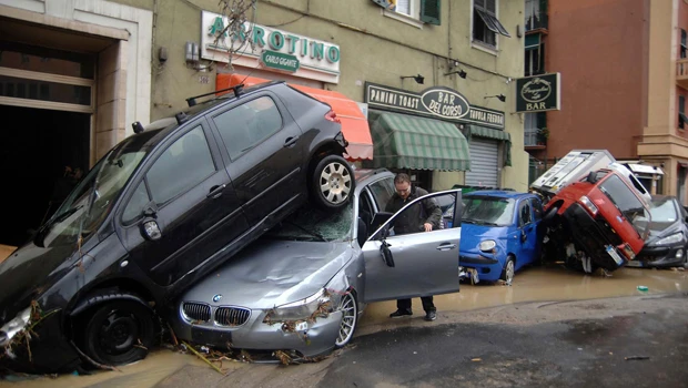 Berlusconi blames improper construction for floods
