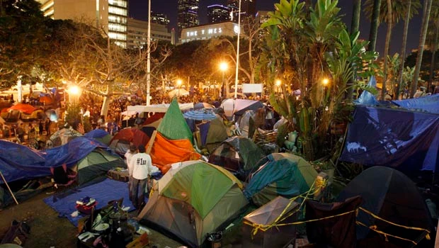 LA protesters defy eviction efforts, go to court
