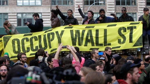 Evicted Wall St. protesters seek rebound with rally