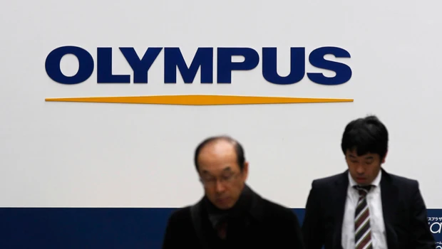 Panel urges legal action in damning Olympus report