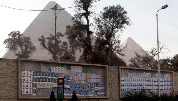 Egyptians back at polls, Cairo calm after clashes