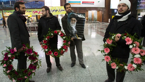 Iranian diplomats expelled from London arrive home