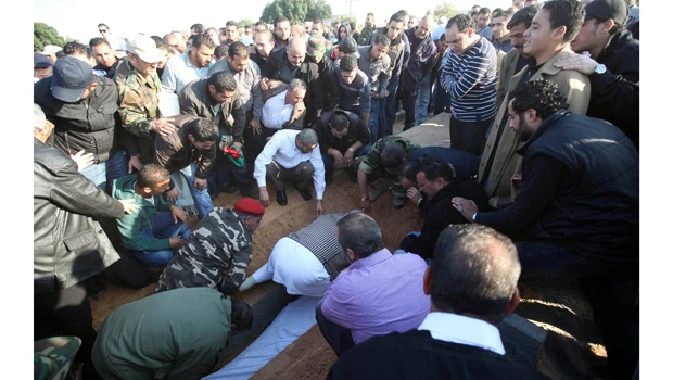 Libya sets year-end deadline for weapons handover