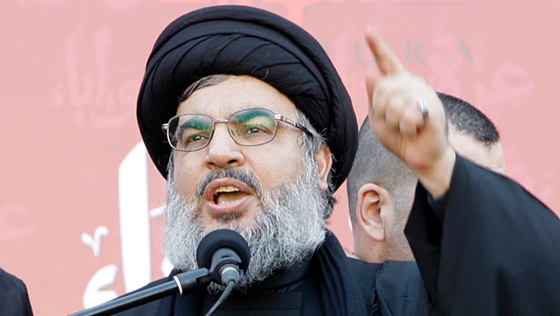 Hezbollah chief in rare public address, says he backs Assad