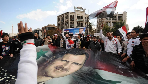 West warns Syria against storming rebel city