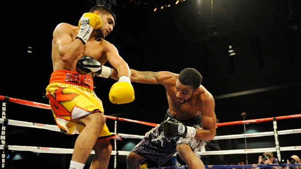 Amir Khan loses titles to Peterson