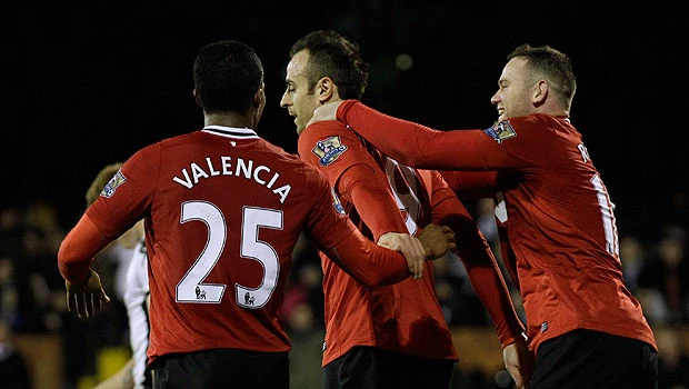 Manchester rivals win as City stays on top