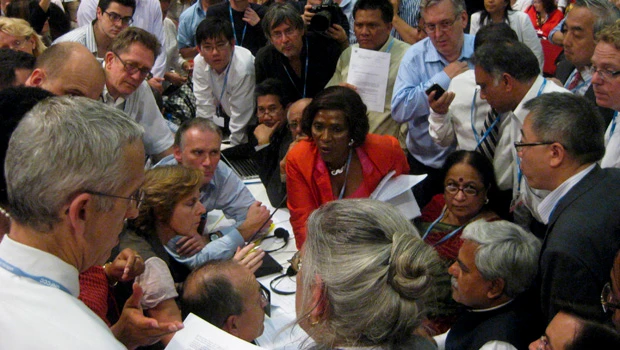 New UN climate deal struck, critics say gains modest