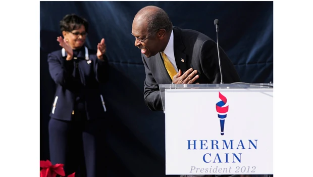Embattled Republican Cain suspends 2012 US campaign