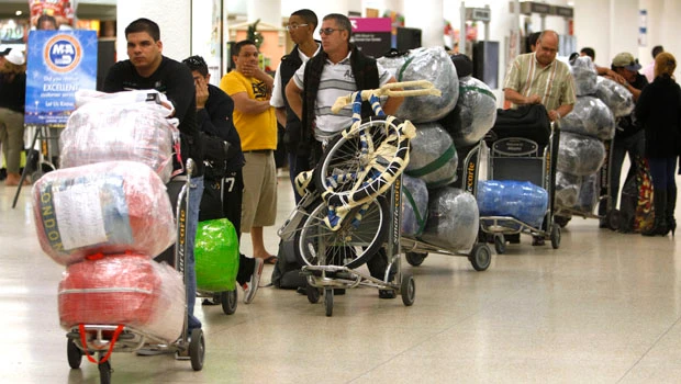 Cuba says travel restrictions to remain in place