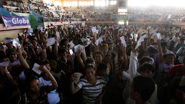 Philippines buries dead, rebuilds after deadly storm
