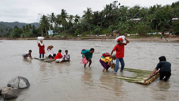 Philippine floods death toll jumps to nearly 1,500