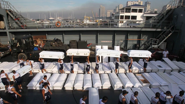 Philippine govt sends coffins as death toll nears 1,000