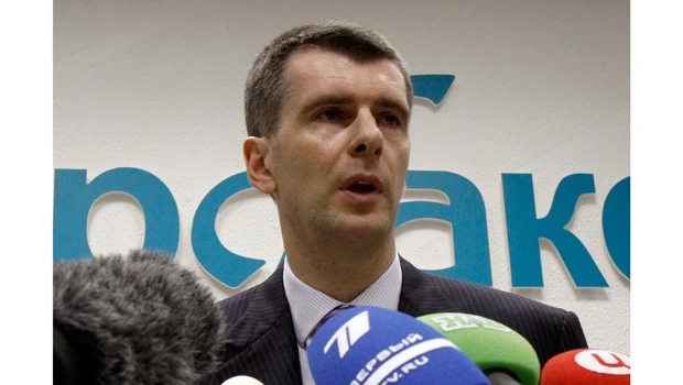 Tycoon to challenge Putin in poll