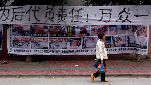 China rebel village sets conditions for calling off march