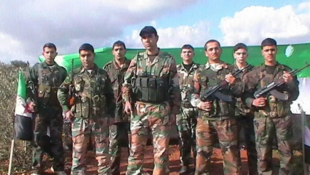 Syrian troops pull back from besieged town: activists