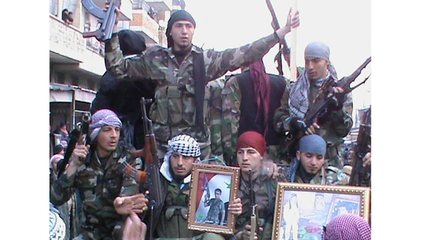 Syrian rebel chief asks world to stop bloodshed