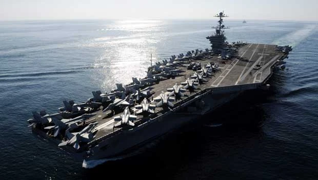 Iran plays down US naval moves