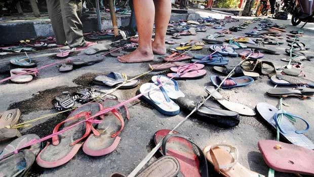 Boy in court over sandal theft