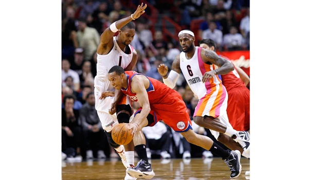 Heat top Sixers to go 6-0 without Wade
