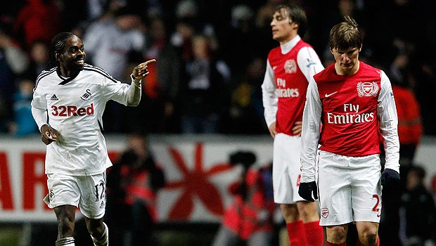 Arsenal’s slim title hopes hit by loss to Swansea