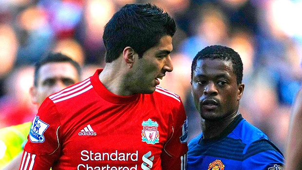 Suarez issues limited apology over racial slur
