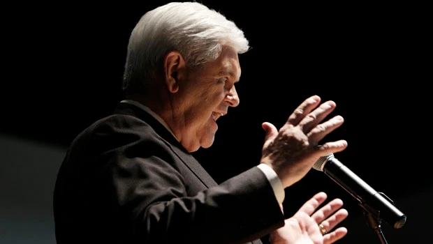 Gingrich falls behind in polls, hits Romney in ad
