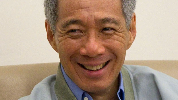 Singapore leaders face massive pay cut