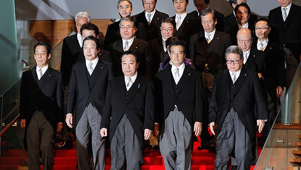 Japan’s PM reshuffles Cabinet to win tax support