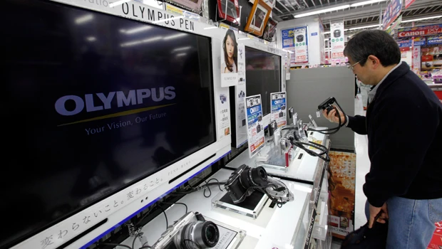 Olympus expects net loss, but core business seen unscathed