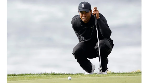 Wi maintains lead as Tiger charges